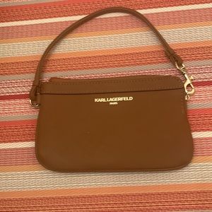Karl Lagerfeld Wristlet. Brownish/Tan. Pre-owned but in good condition.